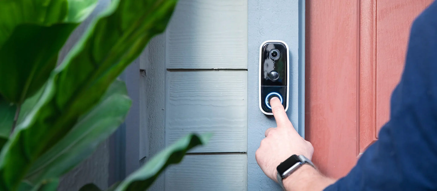 Abode Wireless Video Doorbell WiFi-Connected Video Doorbell With Push-Button mounted on outdoor door frame